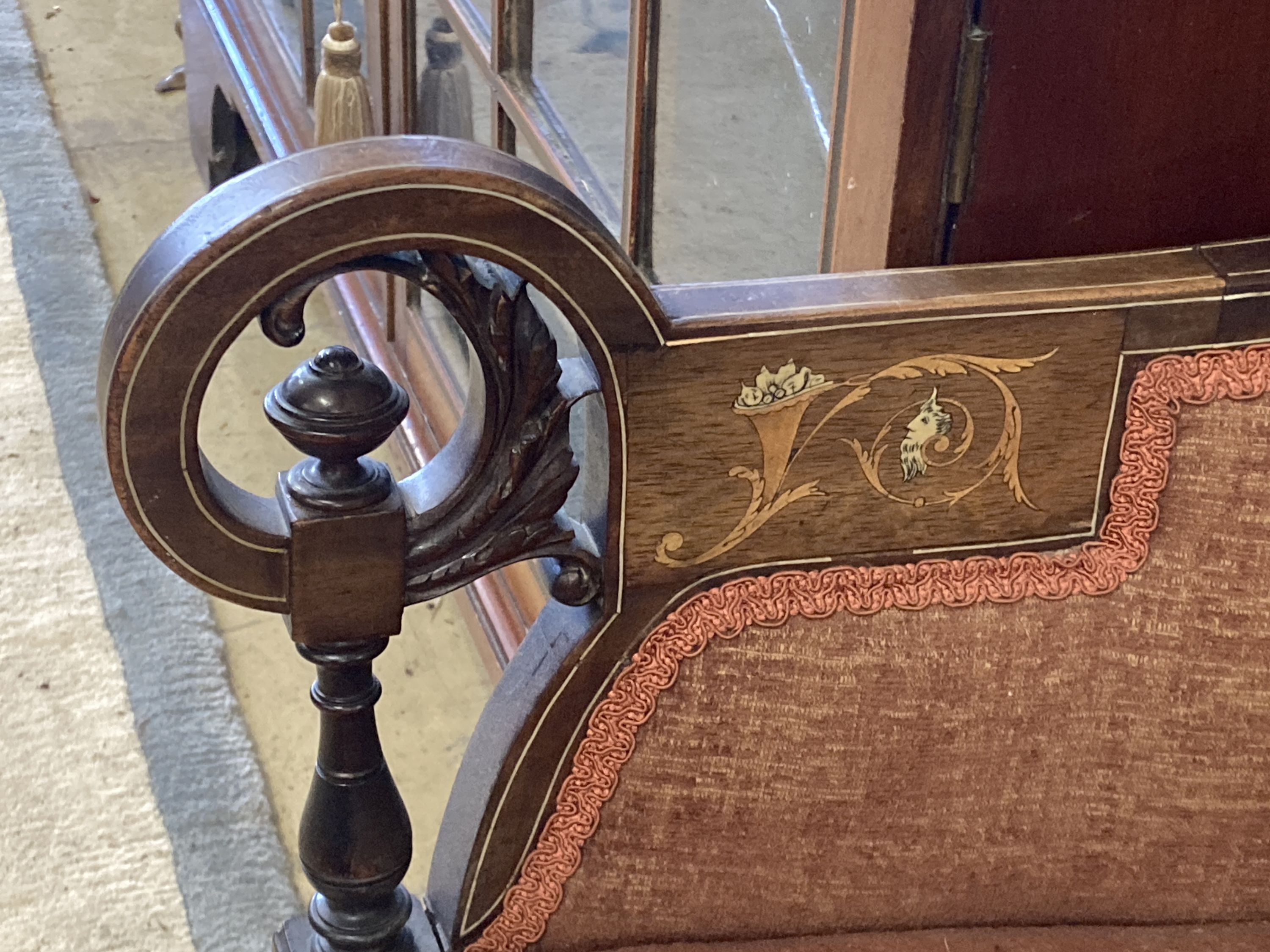 A late Victorian marquetry inlaid rosewood armchair, width 62cm, depth 70cm, height 78cm